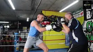 Conor McGregor's teammate Cian Cowley hits pads before Kingpyn Boxing fight