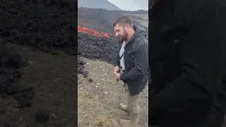 Bare hand touching Iceland lava flow #volcano #lava #burn #iceland #fire #lavaflow #stupid #funny