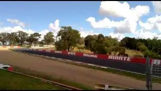 Craig Lowndes completing some Hot Laps around Mount Panorama in his TeamVodafone V8 Supercar