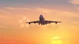 Airplane Flying In Sunset Sky. Stock Footage