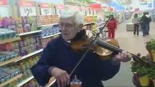 Bill, a Walmart Greeter, Offers Customers a Song