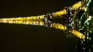 Mark Dawson Eiffel Tower at night.  Lights strobe/flash every 30 minutes.