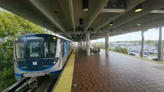 Miami Metrorail Southbound Orange Line train arriving and departing at Dadeland North Station