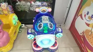 A Little Airplane Kiddie Ride with Big Eyes