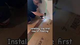Installing the first row of hardwood flooring #flooring #construction #diy