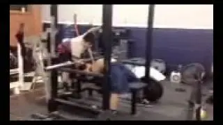 11yr old Michael Womack III bench presses 45lbs. For 42 reps
