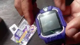 Unboxing the kids' smartwatch - Inserting the SIM card