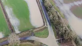 Cycling Through Flooded Road