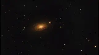Moon over Messier 63 Sunflower Galaxy