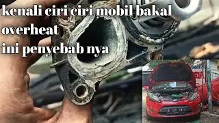 tanda tanda penyebab mobil overheat temperatur panas Ford fiesta buka fanbelt posisi thermostat