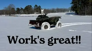 Plowing snow with a four-wheeler