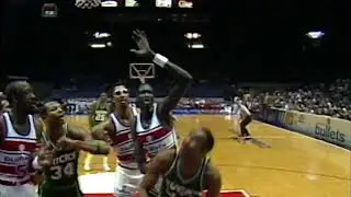 Manute Bol ties an NBA record with 11 blocks in a half on December 12, 1985