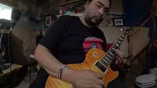 RebelSeven77 jams out to rock backing track