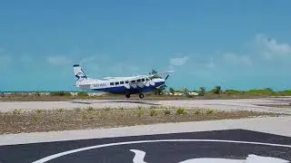 Cessna Caravan departing Cat Cay Airport in the Bahamas.