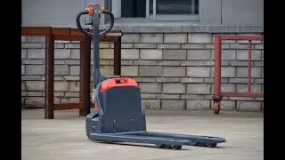 Semi-electric hand pallet truck for transfering bricks. How to transfer bricks for building.