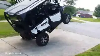 Stock Honda Pioneer 1000 does Wheelie! - High Rez!