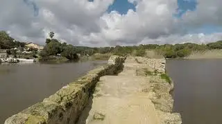 By bike on the Roman Bridge of Calich (Alghero  IT)