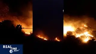 Large wildfire rages near Athens, forcing evacuations