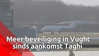 Zwaar bewapende mannen houden de wacht bij de EBI na de komst van Ridouan Taghi