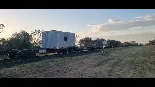 Empty SRS container train through watermark Destination Enfield Sydney 1/1/26