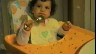 Nikki eats, 10 months old