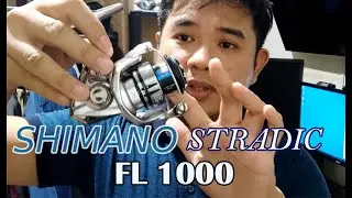 Распаковка Shimano Stradic FL 1000 на английском языке