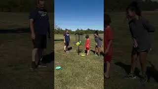 family playing golf desk