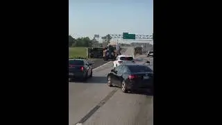 Truck lick car and turn ova