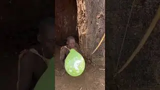 Hadza hunter blows balloons #united #africa #comedy #funny #hadzatribe
