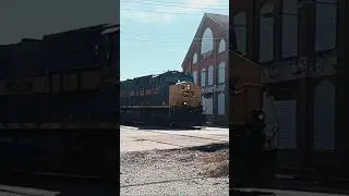 CSX 1897 Monon Heritage Unti Leads Mixed Car Train
