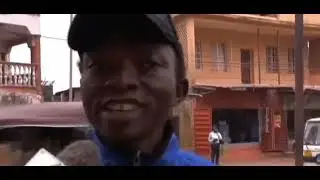 Sierra Leone Police Officers Enforce No Bike Riding at Central Freetown.