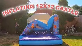 12X12 Blue Balloon Castle Inflating - (Front & Back View)