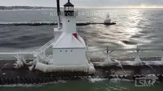 12-25-2022 St. Joseph, MI - Famous Lighthouse Covered in Ice after Blizzard *drone*