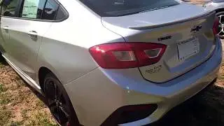 Robert!  Look at this Silver Ice Metallic Red Line Chevrolet Cruze ready for the driveway!