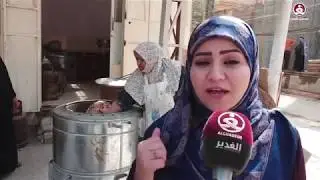 شاهد امرأة عراقية تكافح العيش من اجل بناتها ...