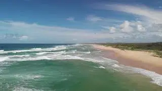 Summer over the Kawana shore break. Sunshine Coast Australia