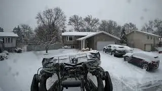 AMI reactor snowplowing with tigers and small children