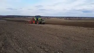 Kverneland e drill compact 4m & Claas Axion 820