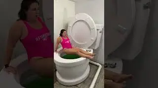 Falling into the the WORLDS LARGEST TOILET GREEN Swimming Pool #shorts