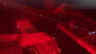 Hands Playing Electronic Keyboard Under Red Lighting in Music Studio