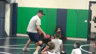 Coach Mike Barreras teaching little kids practice (6&Under)
