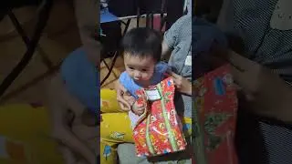 my baby Dylan open his first Christmas gift #shorts