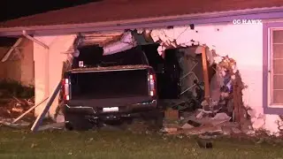 Orange DUI truck into home