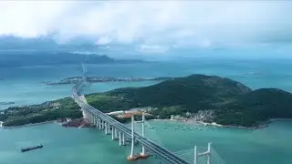 Railway crossing world's longest cross-sea road-rail bridge put into use