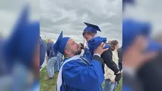 College graduate carries his baby across stage to receive degree, chased by University police