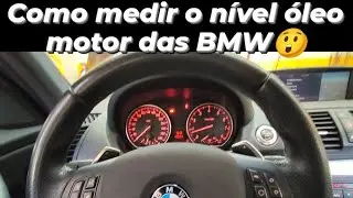 How do I measure the engine oil in a BMW?