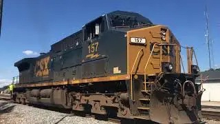 CSX 157 backs to the train