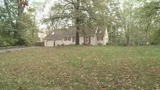 Human remains found in wooded area behind house