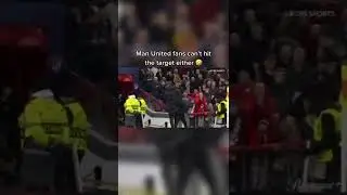 Man United fans throw things at Simeone #shorts #manutd #ucl