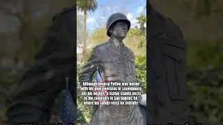 Although General Patton was buried with his men overseas, a statue stands nexts to his family.